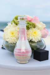 sand and flowers for the wedding
