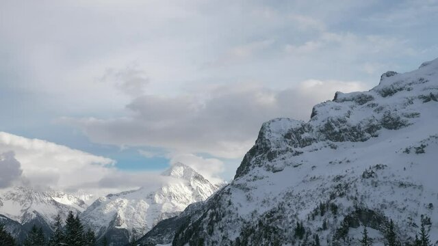 Bristen and Hoch Geissberg Mountains. Picturesque Swiss Alps. Scenic Snowcapped Peaks. Switzerland Europe. Slow motion
