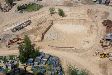 Top view of a bookmark of a residential building. Construction site. Production of apartments,...
