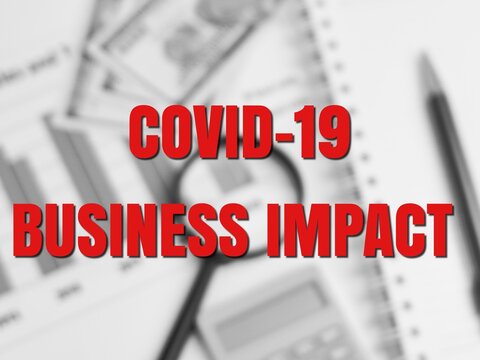 Concept Of Economy And Medical.Phrase COVID 19 BUSINESS IMPACT With Blurry Background.