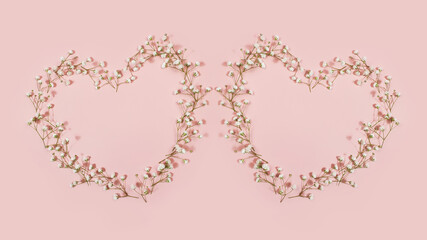 Two Heart shapes from gypsophila flowers in pink background. Top view, copy space.