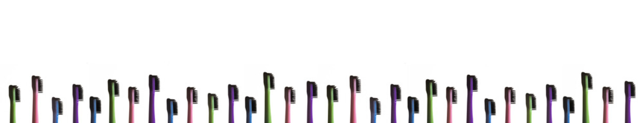 Toothbrushes on white background. long banner