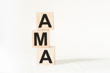 wooden cubes with text AMA . the medicine. medical concept