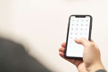 Businessman holding digital tablet in man hands, browsing internet or application with blank screen mock-up for your design at home office with blurry background with free space for custom text