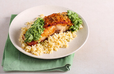 Fried silver carp fillet with green sauce