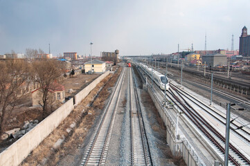 Fototapeta na wymiar Railroad tracks through Chinese city of Zhaodong