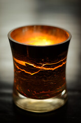 Glowing votive candle