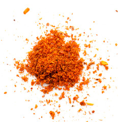 Red pepper powder isolated on white background, top view. Heap of red pepper powder on a white...