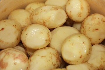 Peeled young potatoes are beautiful and appetizing