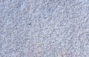 Snow patterns in the sand.