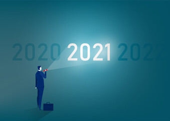 businessman stands with a flashlight to 2021 target cocept  vector