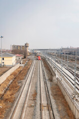 Fototapeta na wymiar Railroad tracks through Chinese city of Zhaodong