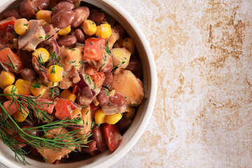 Spanish style quick salad with beans, paprika and chicken fillet