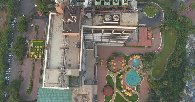 A cinematic drone shot of Taj Lands End hotel in Mumbai seen from an aerial view in slow motion.