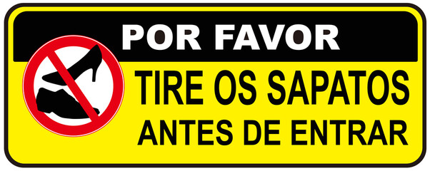 A sign that says in Portuguese Language : please, take off your shoes before entering.
