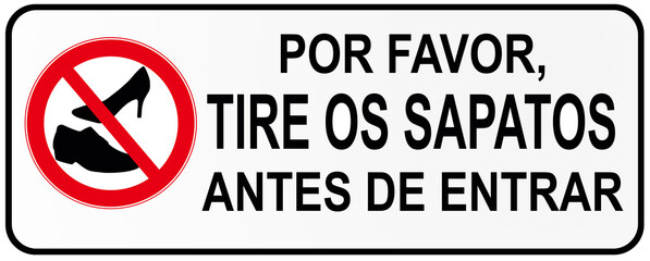 A sign that says in Portuguese Language : please, take off your shoes before entering.