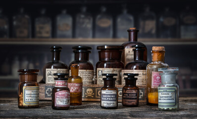 Bottles with drugs from old medical, chemical and pharmaceutical glass. Chemistry and pharmacy...