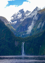 New Zealand, South Island, amazing waterfall and mountains in the Milfort Sound.