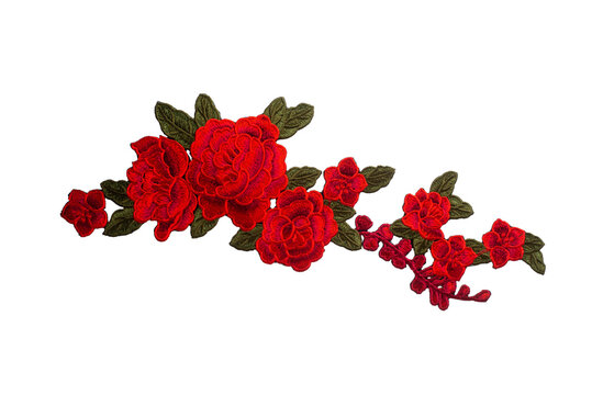 Embroidered composition of red flowers isolated on white background