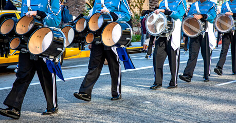 Marching band with drums dressed in blue