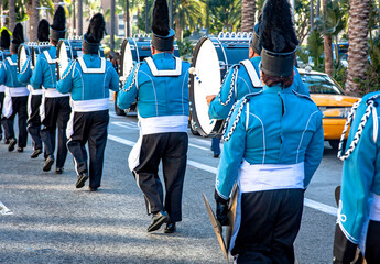 Marching band with drums dressed in blue