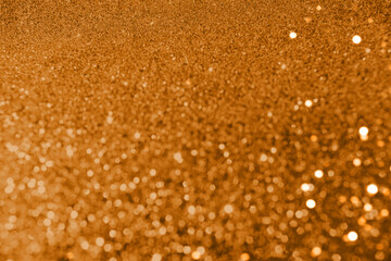 Abstract bright golden sparkling New Year or Christmas background for your creative design or greetings card. Festive background, anniversary celebration concept