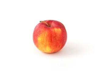 Red seasonal apple isolated on white background.