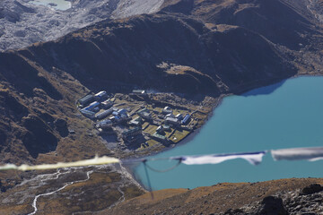 View on Gokyo from Gokyo Ri Peak with prayer flags in the foreground