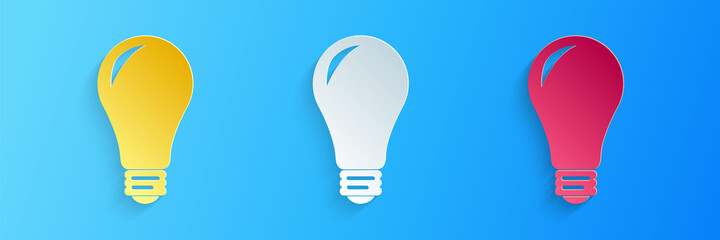 Paper cut Light bulb icon isolated on blue background. Energy and idea symbol. Lamp electric. Paper art style. Vector.