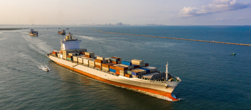 Aerial view container ship in ocean, Global business logistic industry company commercial import export logistic transportation oversea worldwide, Sea freight shipping cargo company vessel.