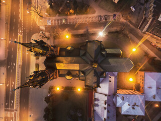 Cathedral of Holy Family in Tarnow, Poland. Top Down Drone Aerial View. Illuminated at Twilight