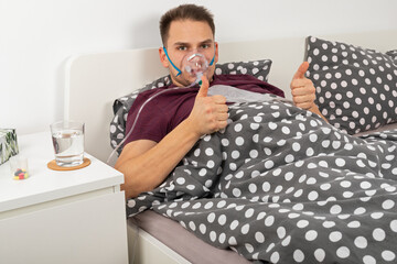 Man with oxygen mask at home