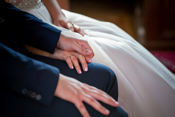 bride and groom holding hands