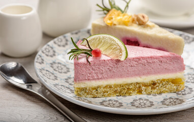 Two pieces of raw food cake on a plate.