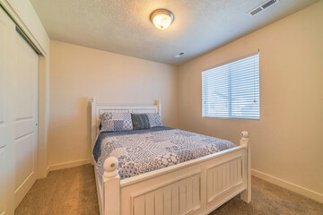 Bedroom interior with double bed window and flush mount dome ceiling light