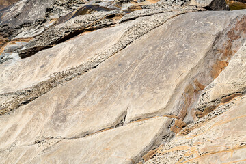 The surface of weathered rock formations on the Pacific coast at Cape Sebastian State Park, Oregon, USA