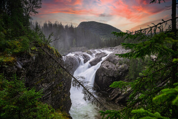 Rjukandefoss waterfall in red colours