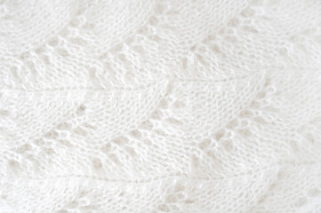 Hand knitting. Handmade wool sweater texture background.