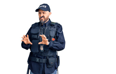 Fototapeta premium Young handsome man wearing police uniform disgusted expression, displeased and fearful doing disgust face because aversion reaction.