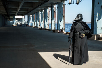 plague doctor in an empty city on an empty marina