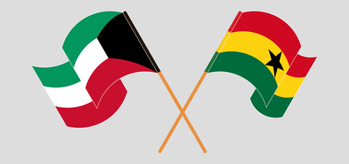 Crossed and waving flags of Kuwait and Ghana