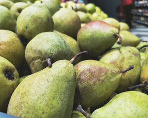 pears cart upsets the district vegetables and fruits shelf in store basket falling
