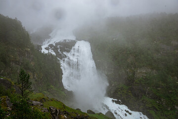 Nyastolfossen in fog from the waterfalls of Husedalen