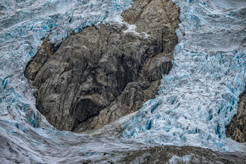 Buerbreen glacier with rocks around it