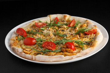 fragrant and hot pizza on a dark background