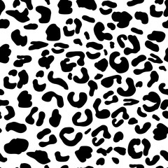 Leopard print, seamless pattern. Black spots on a white background. Wild animal imitation, cheetah or leopard skin. Vector illustration, feline monochrome ethnic pattern design. Simple drawing