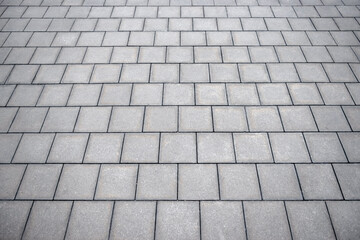 Texture of some ground stone blocks in perspective
