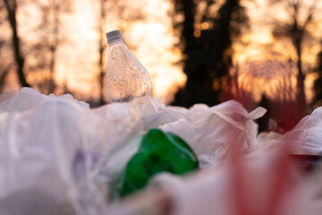 plastic garbage pile, plastic bottle and plastic bags, environmental pollution
