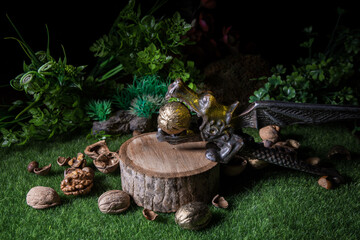 Still life with Walnut kernels and whole walnuts on rustic old wooden table. Creative table decoration.