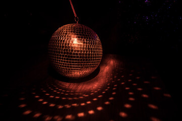 Colorful disco mirror ball lights night club background. Party lights disco ball. Selective focus
